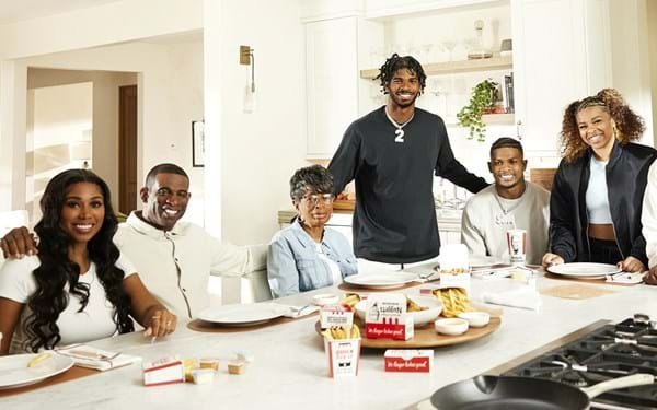 Coach Prime and family in new KFC Commercial